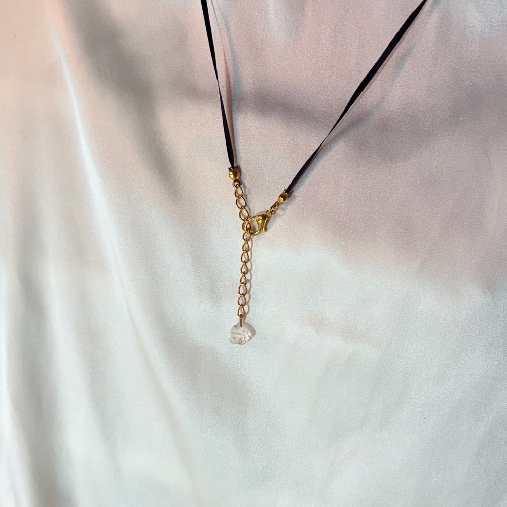 Black and gold with a clear quartz rose necklace
